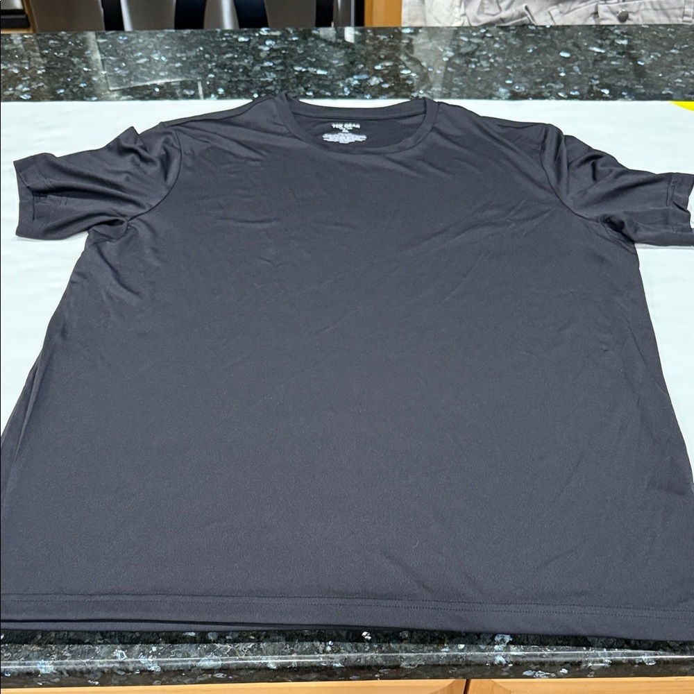 Brand new TEL GEAR shirt size XL.